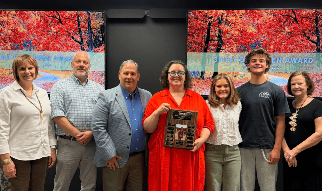 2026 Spirit of Lauren Award recipient Erin Curry pictured with Sain leadership and Lauren Nickles’ family.